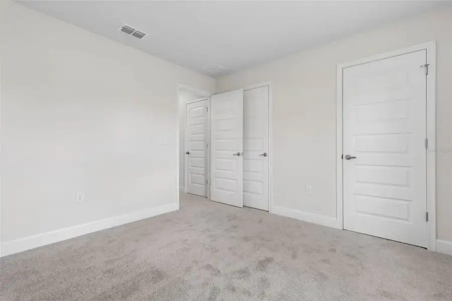 Representative unfurnished interior of a home built from the 2117 by Adams Homes in Flagler Estates, Hastings (Image 29).