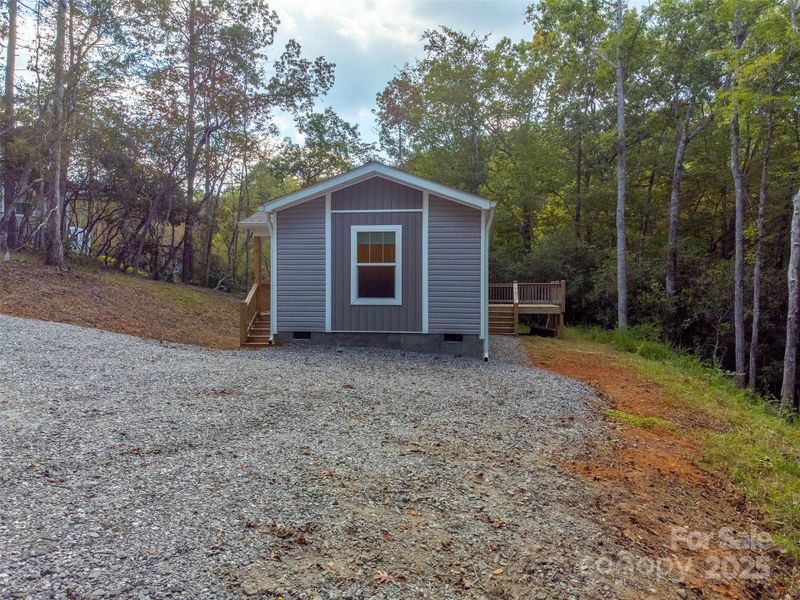 Exterior details and patio area of a home in , Hayesville (Image 27).