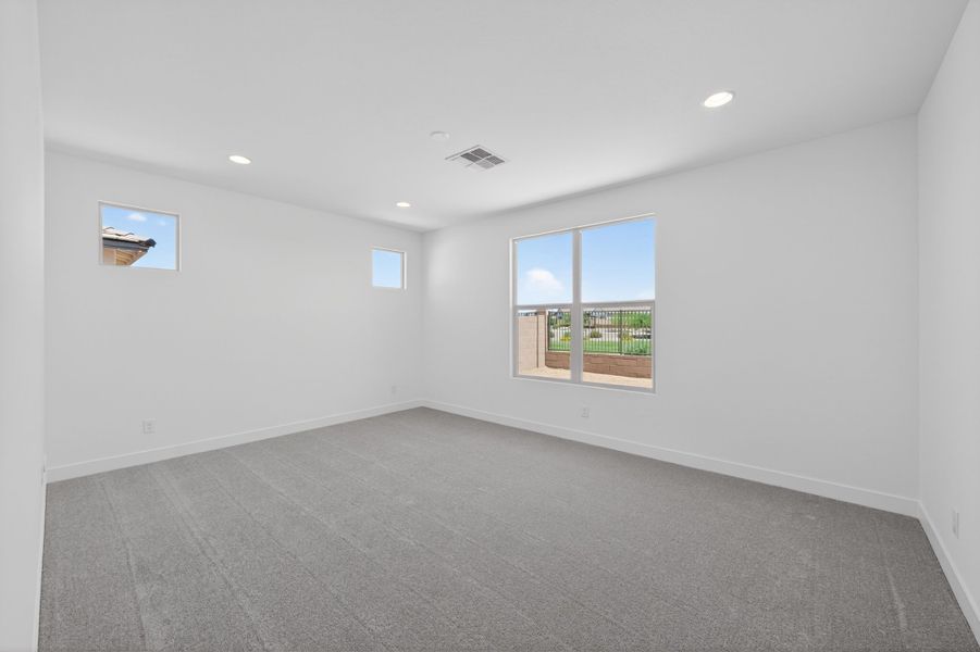 Spacious, unfurnished interior of a new home in Artisan at Asante, Surprise (Image 21).