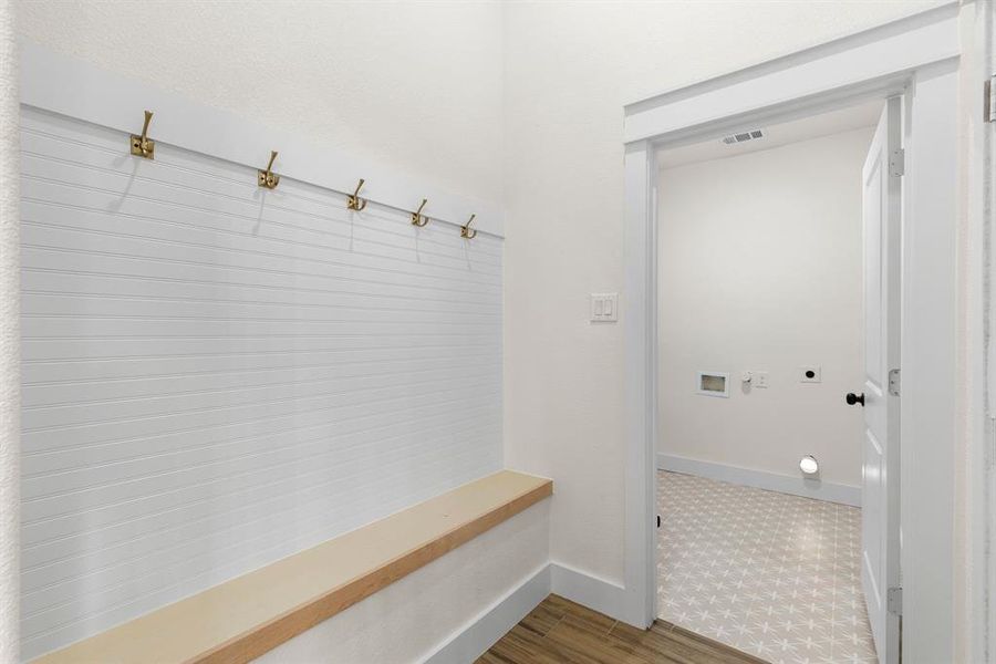 Mudroom featuring hardwood / wood-style flooring