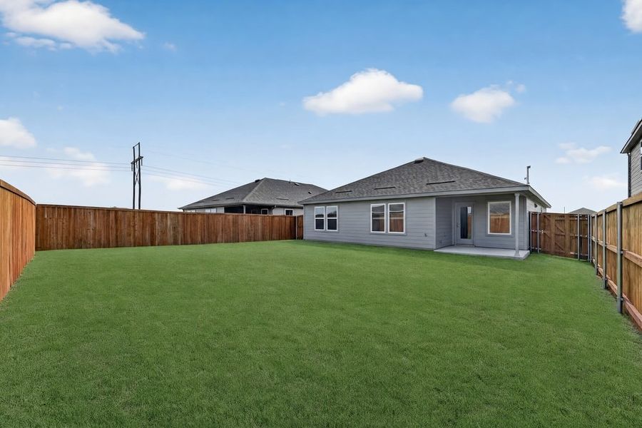 Exterior details and patio area of a home in River Ridge, Crandall (Image 3).