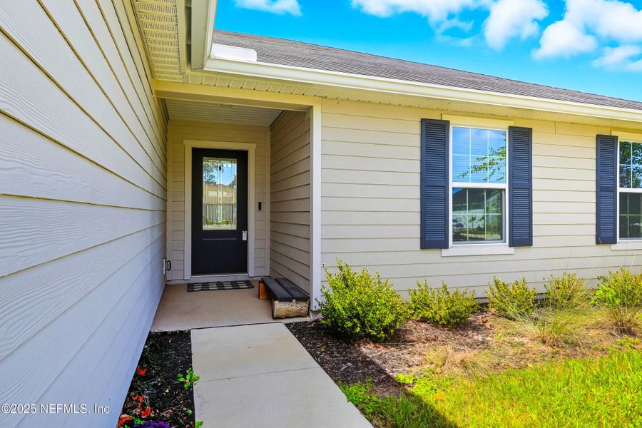 Front exterior of a new home in , Jacksonville, FL, highlighting curb appeal (Image 18).