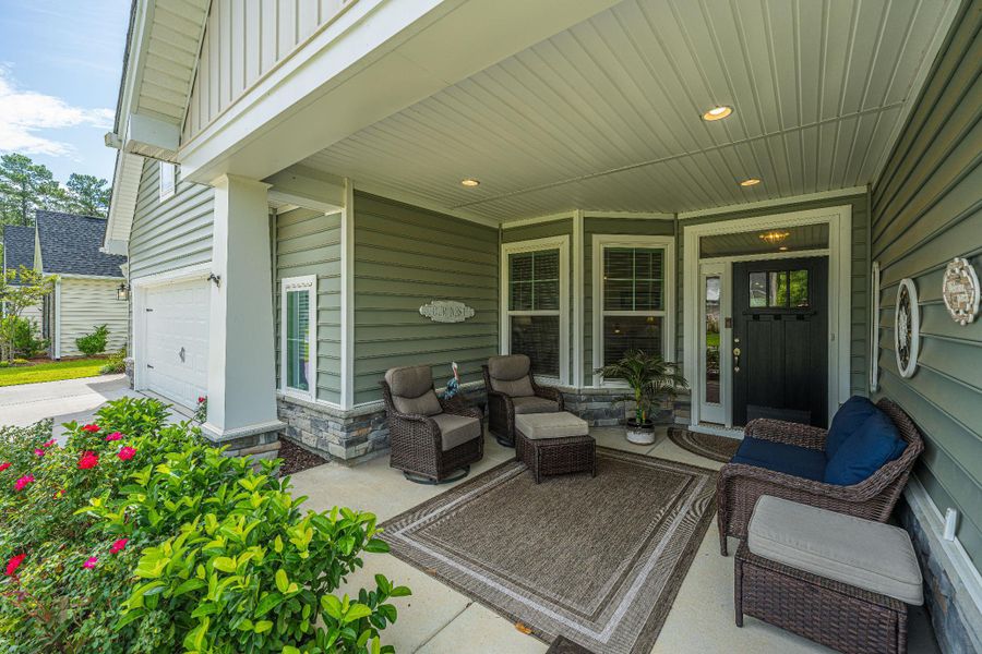 Exterior details and patio area of a home in The Enclave at French Quarter Creek, Huger (Image 3). Exterior details and patio area of a home in The Enclave at French Quarter Creek, Huger (Image 3).
