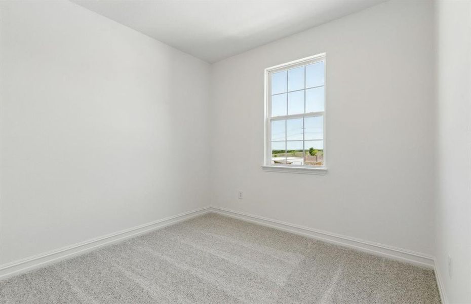 Spacious secondary bedroom with ample closet space Spacious secondary bedroom with ample closet space