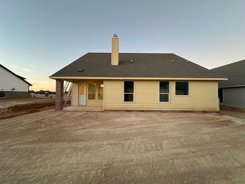 Exterior details and patio area of a home in Covenant Park, Springtown (Image 2). Exterior details and patio area of a home in Covenant Park, Springtown (Image 2).