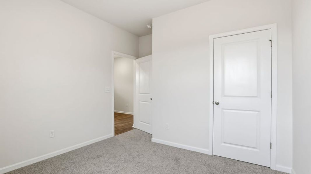 Spacious, unfurnished interior of a new home in Waverly Station, Greenwood (Image 14).