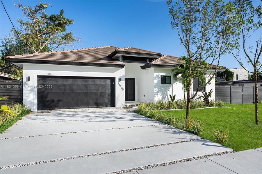 Front exterior of a new home in , Cutler Bay, FL, highlighting curb appeal (Image 18).