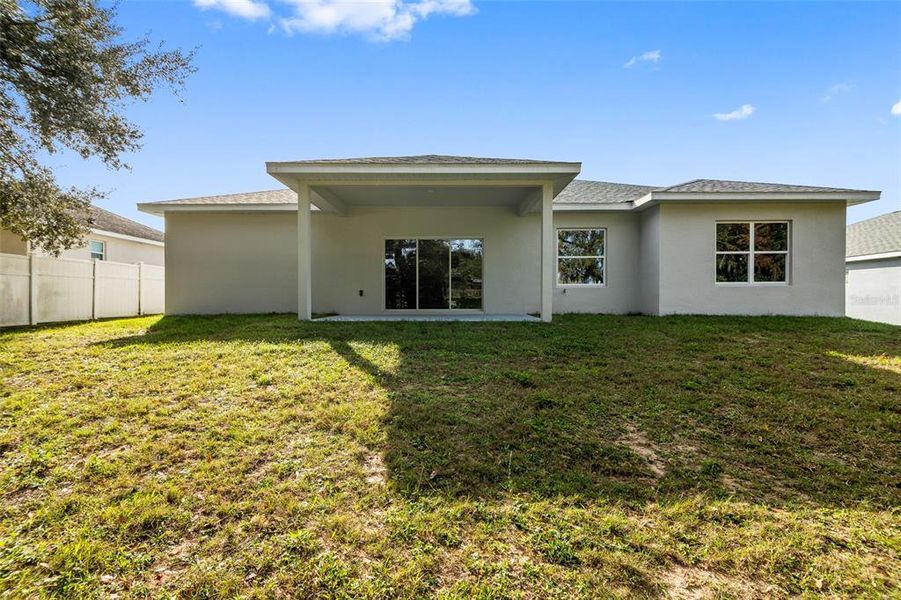 Exterior details and patio area of a home in SummerCrest, Ocala (Image 22).