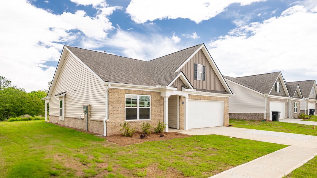 Front exterior of a new home in Price's Crossing, LaFayette, GA, highlighting curb appeal (Image 19).