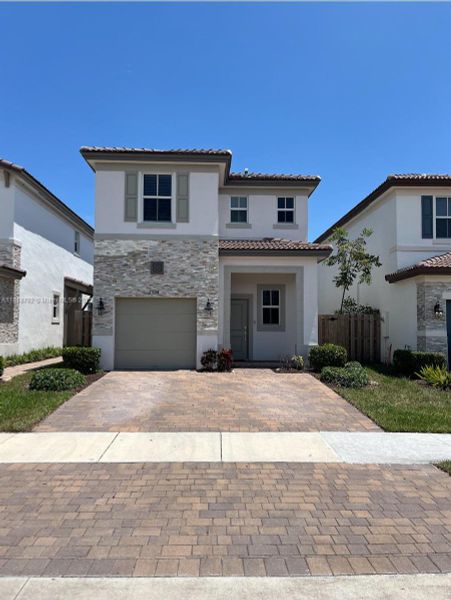 Front exterior of a new home in , Miami, FL, highlighting curb appeal (Image 2). Front exterior of a new home in , Miami, FL, highlighting curb appeal (Image 2).