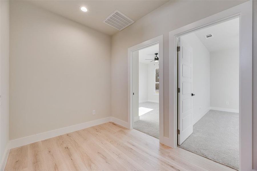 Empty room with light wood-style flooring, recessed lighting, and ceiling fan Empty room with light wood-style flooring, recessed lighting, and ceiling fan