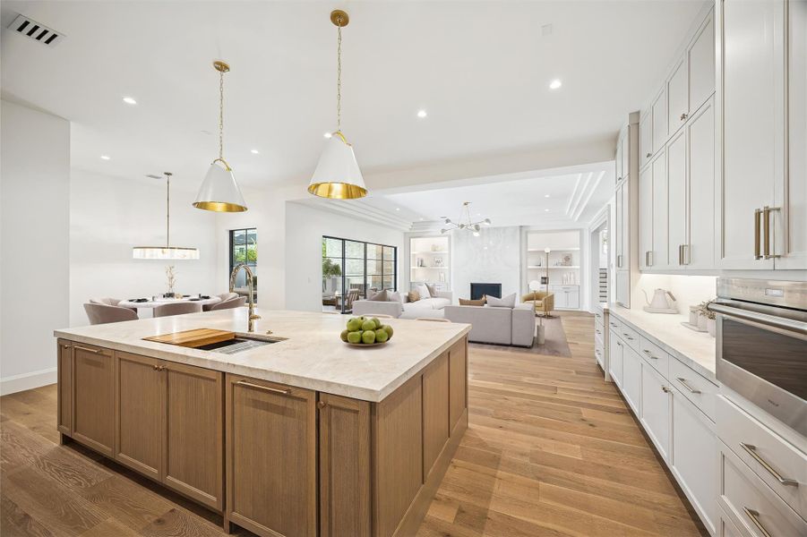Kitchen looking into the breakfast and living room. Photo is virtually staged. Kitchen looking into the breakfast and living room. Photo is virtually staged.