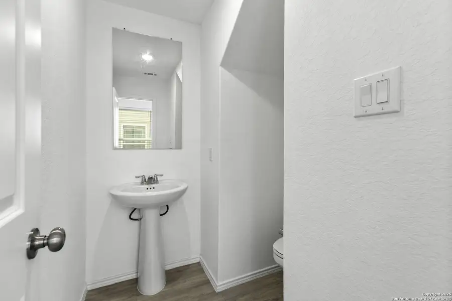 Furnished interior view inside a new home in Presa Point, San Antonio (Image 6).