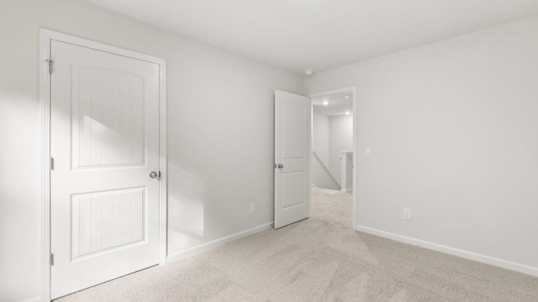 Spacious, unfurnished interior of a new home in Waypoint, Flowery Branch (Image 18).