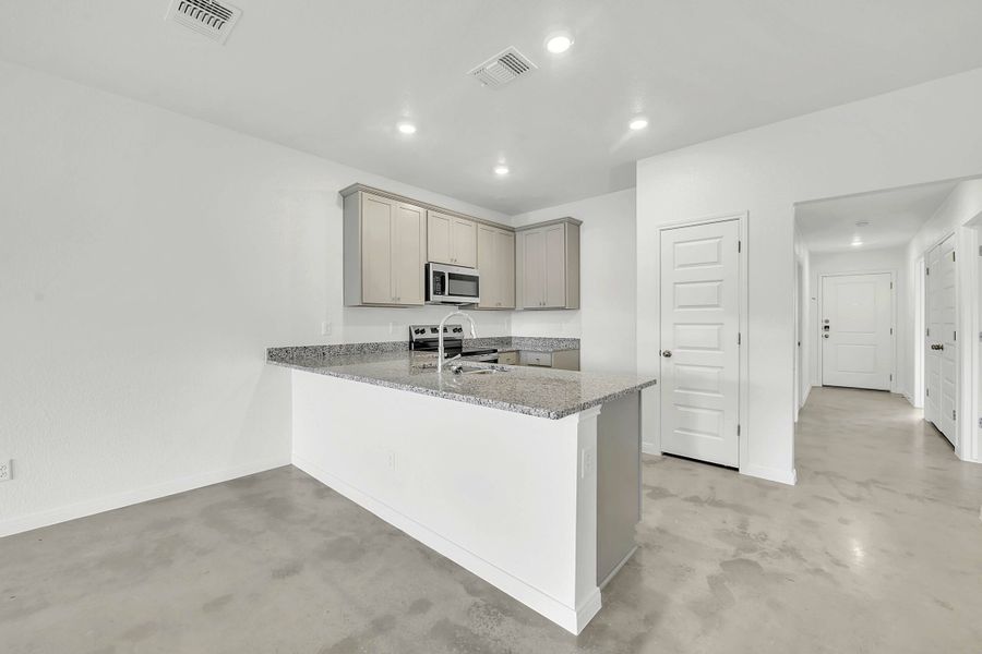 Furnished interior view inside a new home in The Valley at Great Hills Duplexes, Copperas Cove (Image 4). Furnished interior view inside a new home in The Valley at Great Hills Duplexes, Copperas Cove (Image 4).