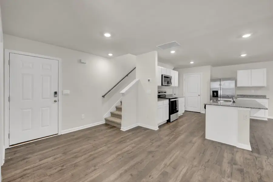 Representative unfurnished interior of a home built from the Aisle by D.R. Horton in Hawk's Ridge, Rossville (Image 12). Representative unfurnished interior of a home built from the Aisle by D.R. Horton in Hawk's Ridge, Rossville (Image 12).