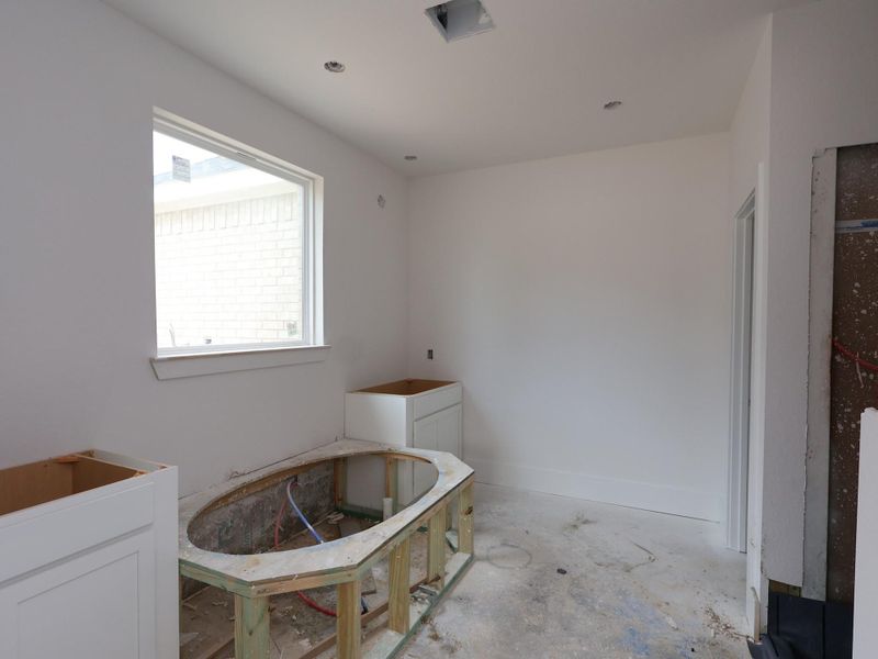 In-progress construction of a new home in The Oaks on 6th Street, Magnolia, TX (Image 11).