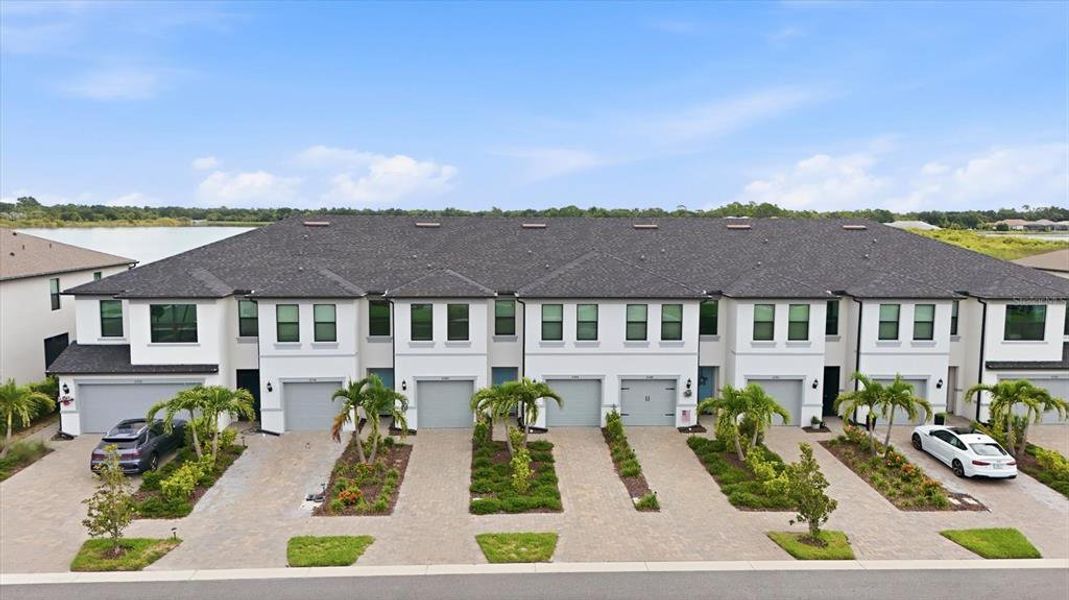 Front exterior of a new home in , Sarasota, FL, highlighting curb appeal (Image 22). Front exterior of a new home in , Sarasota, FL, highlighting curb appeal (Image 22).