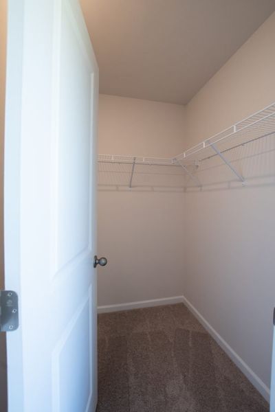 Representative unfurnished interior of a home built from the Fairfax by Piedmont Residential in Falls Creek, Flowery Branch (Image 24).