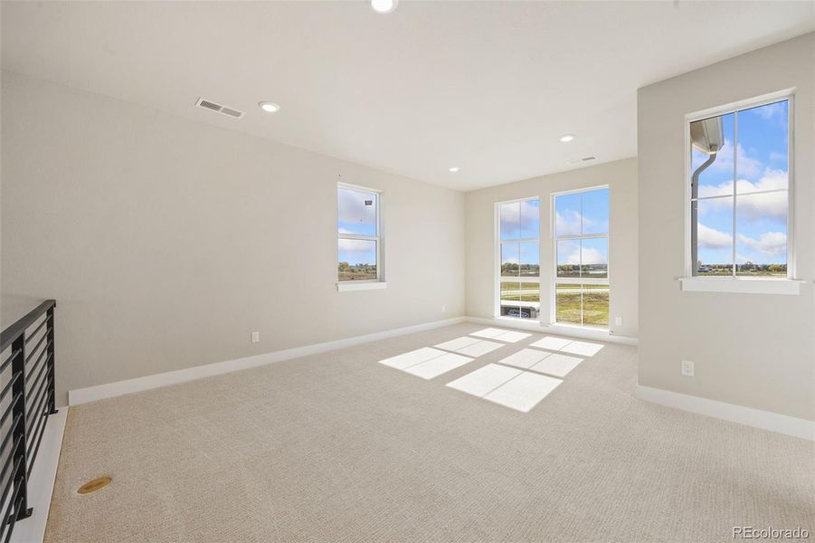 Spacious, unfurnished interior of a new home in Kitchel Lake at Serratoga Falls, Timnath (Image 12).