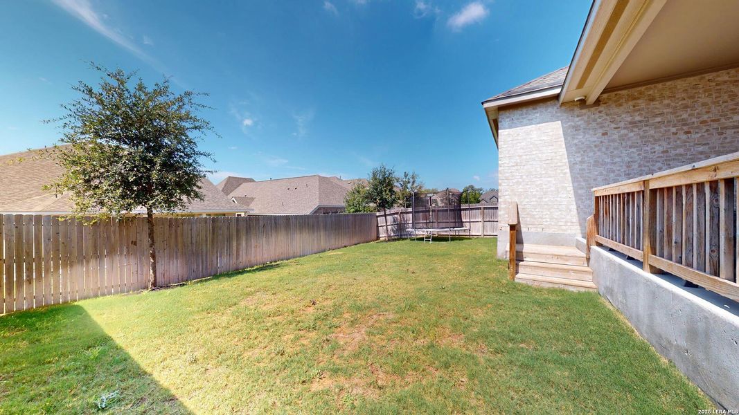 Exterior details and patio area of a home in Bison Ridge, San Antonio (Image 22).
