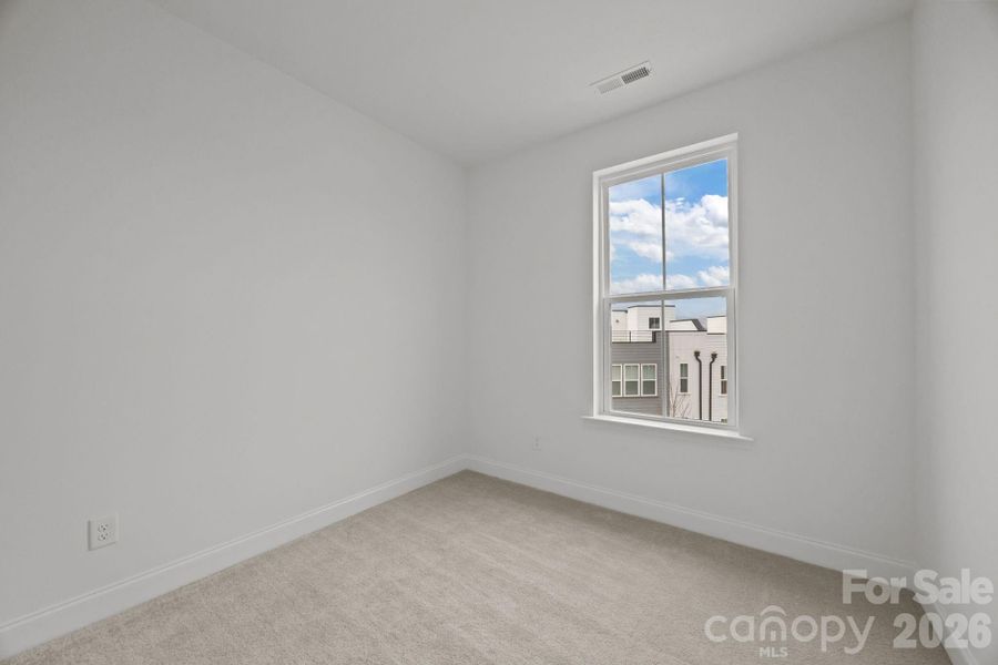 Spacious, unfurnished interior of a new home in The River District Townhomes, Charlotte (Image 21).