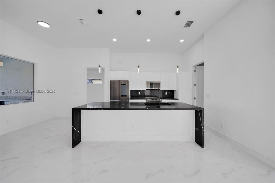 Furnished interior view inside a new home in , Cape Coral (Image 12). Furnished interior view inside a new home in , Cape Coral (Image 12).