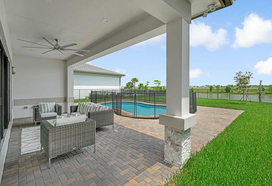 Exterior details and patio area of a home in Apex at Avenir, Palm Beach Gardens (Image 38).