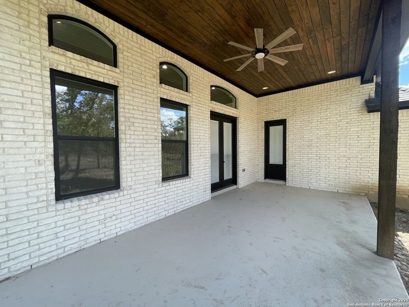 Exterior details and patio area of a home in , Castroville (Image 3).