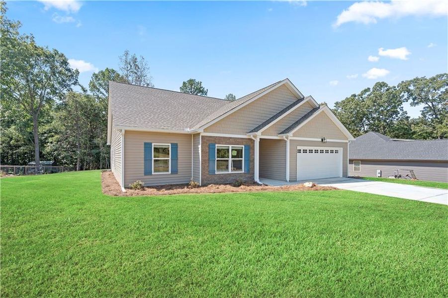 Front exterior of a new home in , Rydal, GA, highlighting curb appeal (Image 24).
