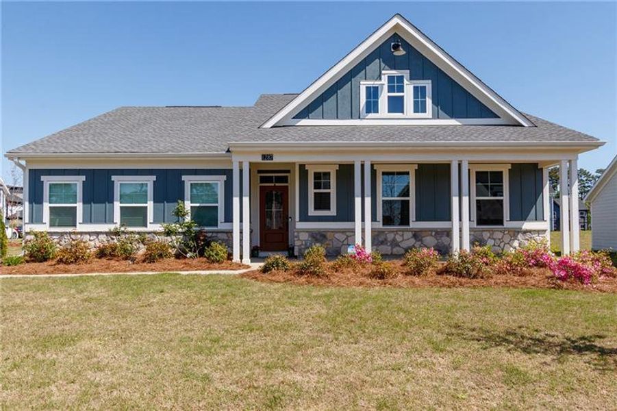 Front exterior of a new home in Sweetbay Farm, Lawrenceville, GA, highlighting curb appeal (Image 28).