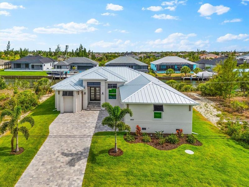 Front exterior of a new home in , Port Charlotte, FL, highlighting curb appeal (Image 2).