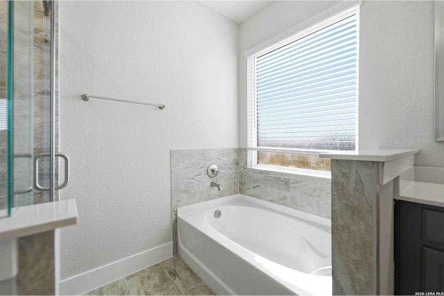 Furnished interior view inside a new home in The Woodlands at Medina Hills, Mico (Image 11).