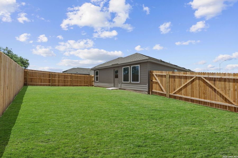 Exterior details and patio area of a home in Guadalupe Ridge, New Braunfels (Image 2).