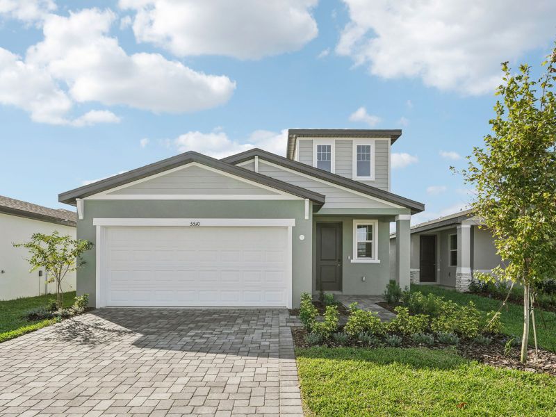 Front exterior of a new home in Crosswinds - Classic Series, Haines City, FL, highlighting curb appeal (Image 1).