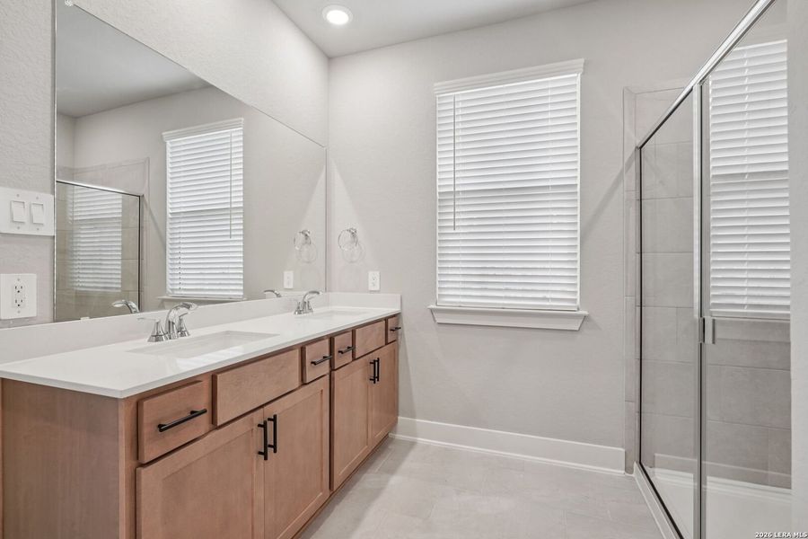 Furnished interior view inside a new home in Estancia Ranch - Premier Series, San Antonio (Image 14).