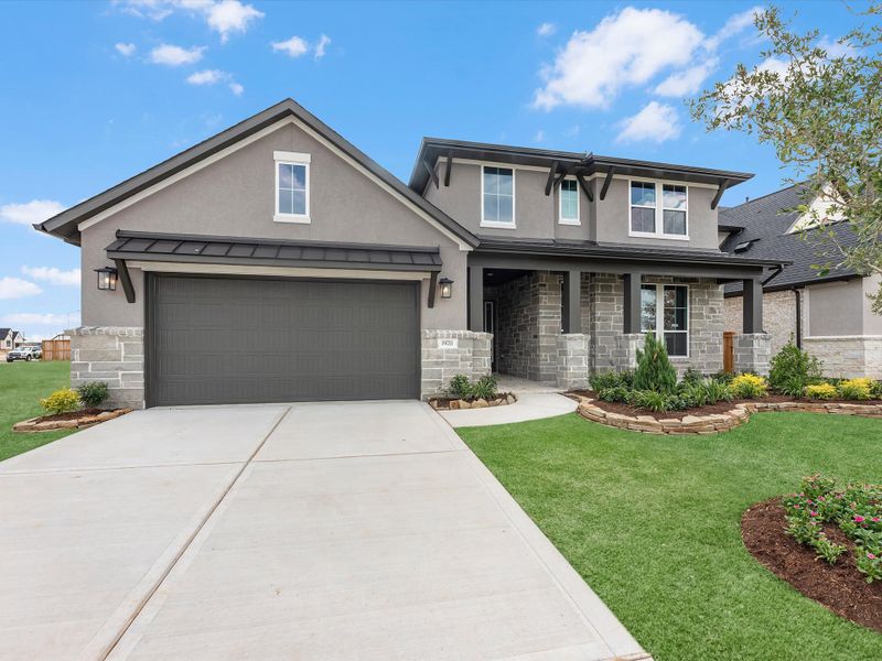 Front exterior of a new home in Dunham Pointe, Cypress, TX, highlighting curb appeal (Image 2). Front exterior of a new home in Dunham Pointe, Cypress, TX, highlighting curb appeal (Image 2).