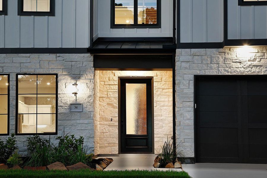 Exterior details and patio area of a home in , The Woodlands (Image 4). Exterior details and patio area of a home in , The Woodlands (Image 4).