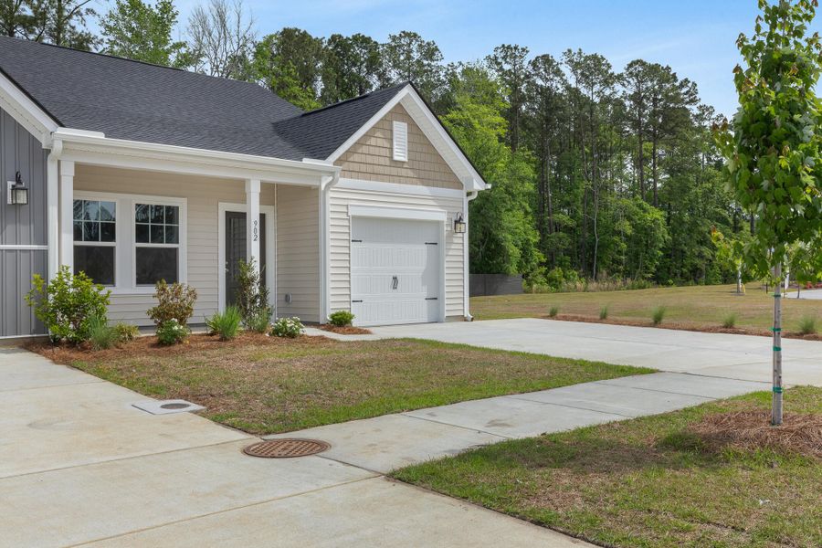 Front exterior of a new home in Hammock Walk at Nexton, Summerville, SC, highlighting curb appeal (Image 1). Front exterior of a new home in Hammock Walk at Nexton, Summerville, SC, highlighting curb appeal (Image 1).