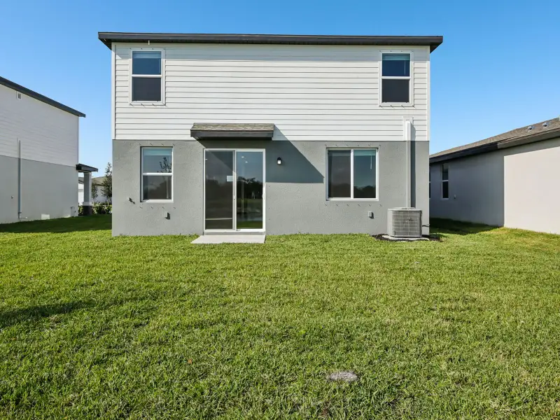 Exterior details and patio area of a home in Oakfield Trails - Premier Series, Parrish (Image 4).