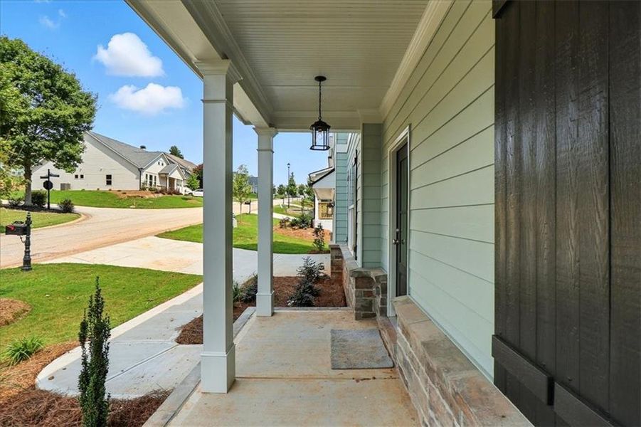 Exterior details and patio area of a home in Traditions of Braselton, Jefferson (Image 28).