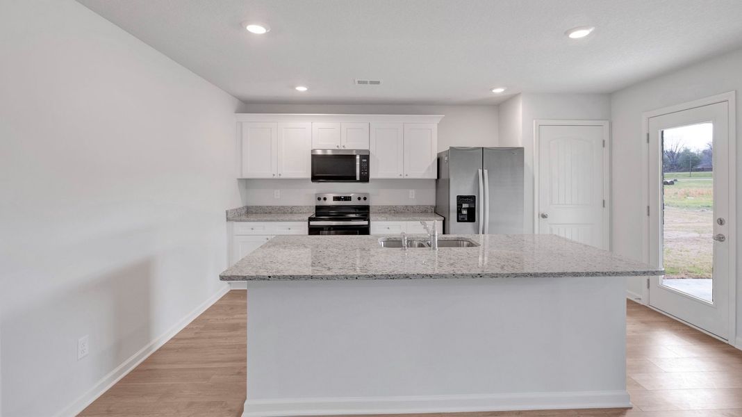 Furnished interior view inside a new home in Riggs Pointe, Millington (Image 4).