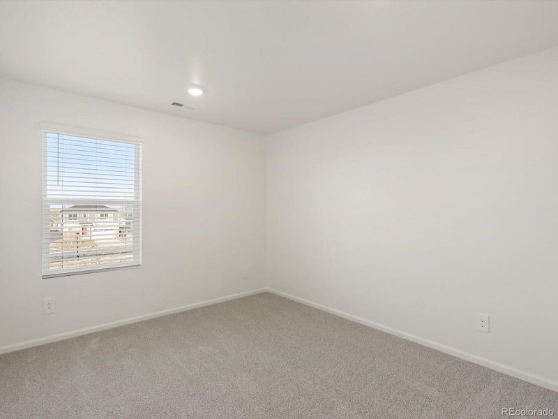 Spacious, unfurnished interior of a new home in Westgate, Greeley (Image 26).
