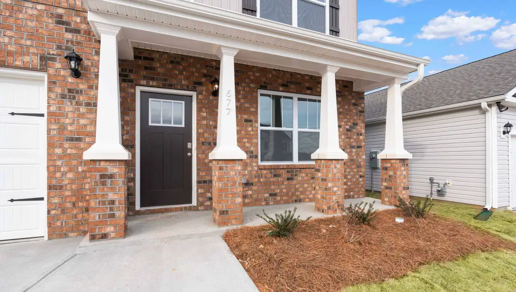 Exterior details and patio area of a home in Benjamin's Grove, Woodruff (Image 2). Exterior details and patio area of a home in Benjamin's Grove, Woodruff (Image 2).