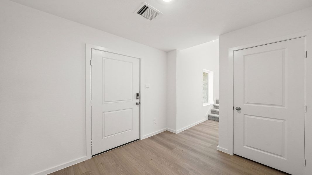 Representative unfurnished interior of a home built from the Callahan by D.R. Horton in Lexington Heights, Willis (Image 11).