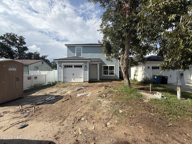 Front exterior of a new home in , Jacksonville, FL, highlighting curb appeal (Image 1). Front exterior of a new home in , Jacksonville, FL, highlighting curb appeal (Image 1).