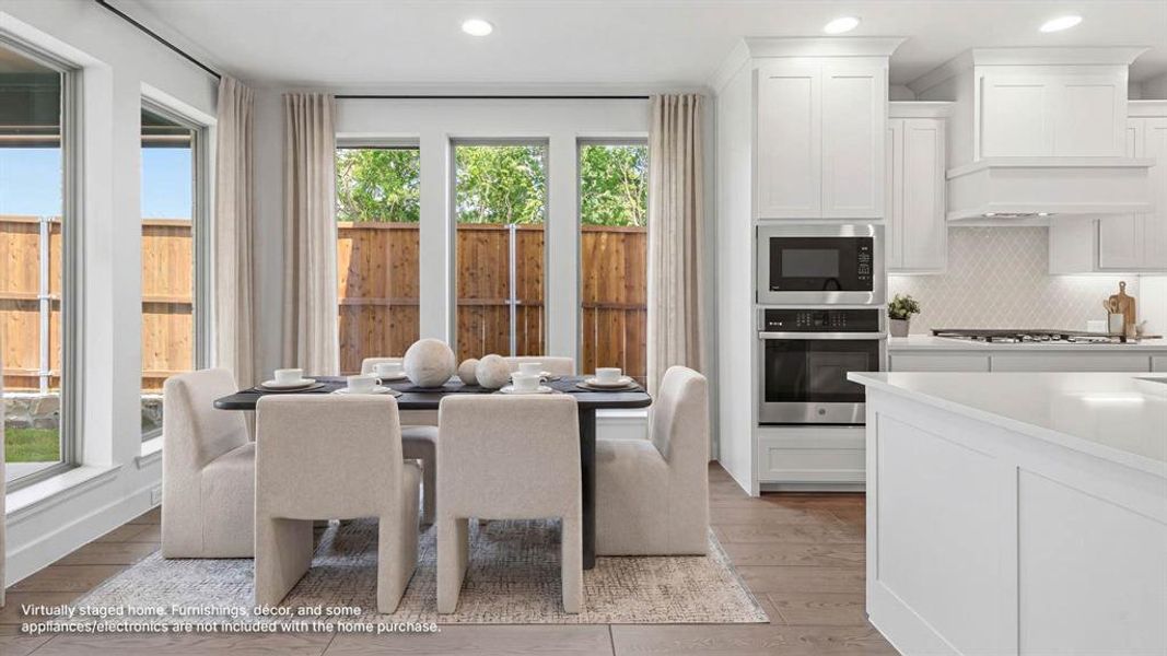 Furnished interior view inside a new home in The Heights at Uptown Celina, Celina (Image 8).