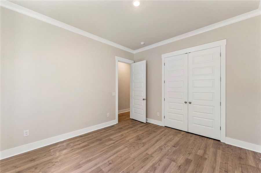 Bedroom 3 -Images are of a different home with a s