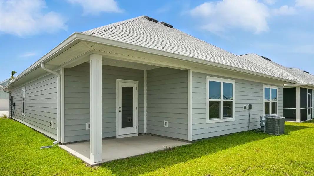 Exterior details and patio area of a home in WindMark Beach, Port Saint Joe (Image 4).