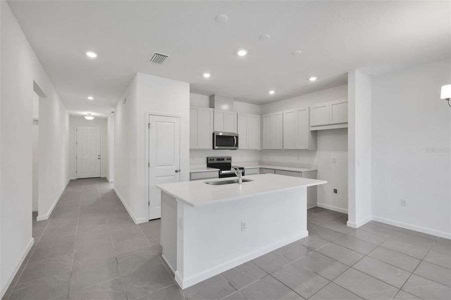 Furnished interior view inside a new home in Seaport Village, Tavares (Image 10).